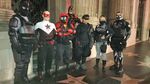 Crimson Fist (second from left) patrolling in Holywood with other heroes