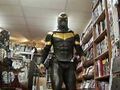 Phoenix exiting a local comic book store where he goes to suit up.