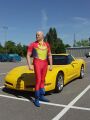 Superhero poses with his Corvette (circa 2015)